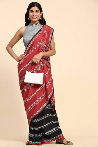 Red printed silk blend ethnic saree with blouse piece