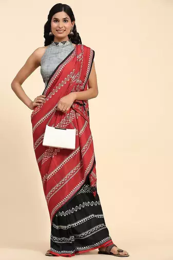 Red printed silk blend ethnic saree with blouse piece