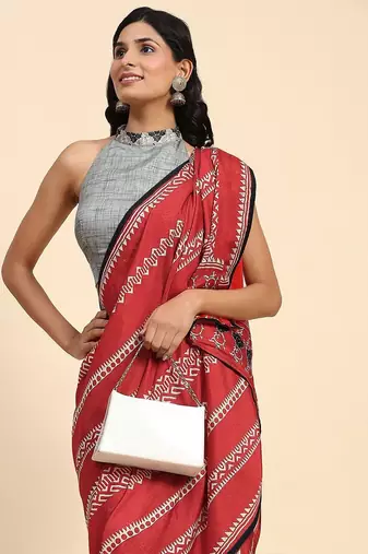 Red printed silk blend ethnic saree with blouse piece