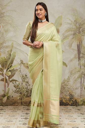 Green elegant zari woven linen saree with blouse piece