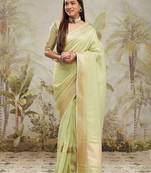 Green elegant zari woven linen saree with blouse piece