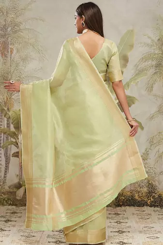 Green elegant zari woven linen saree with blouse piece