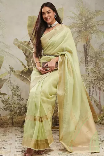 Green elegant zari woven linen saree with blouse piece