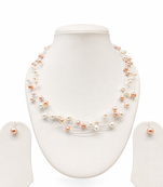 Floating freshwater pearl necklace and earring set, multi-strand, white and peach, with silver clasp