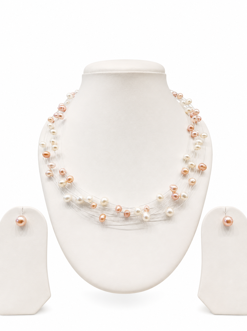 Floating freshwater pearl necklace and earring set, multi-strand, white and peach, with silver clasp