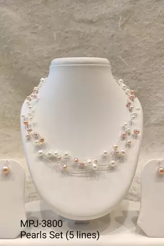 Floating freshwater pearl necklace and earring set, multi-strand, white and peach, with silver clasp