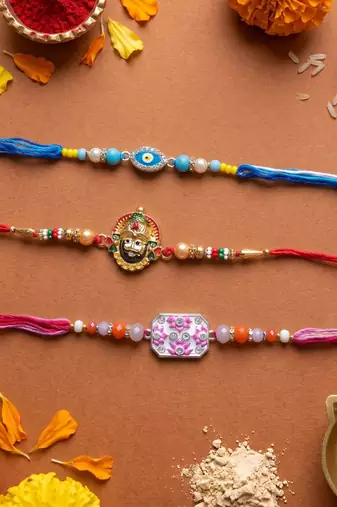 Multi color set of 3 thread rakhis stylish design