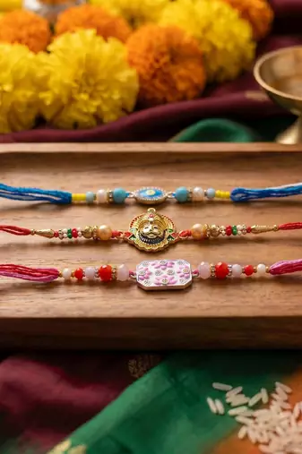 Multi color set of 3 thread rakhis stylish design