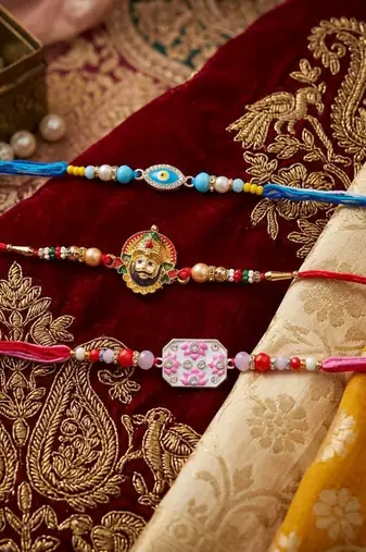 Multi color set of 3 thread rakhis stylish design