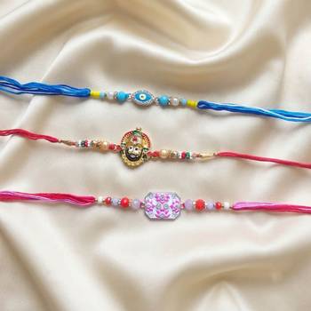 Multi color set of 3 thread rakhis stylish design 4