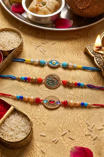 Multi color set of 3 thread rakhis handmade design