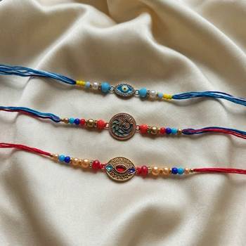 Multi color set of 3 thread rakhis handmade design 4