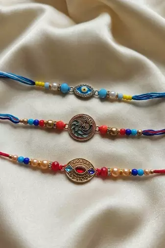 Multi color set of 3 thread rakhis handmade design