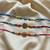 Multi color set of 3 thread rakhis handmade design