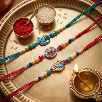 Multi color set of 3 thread rakhis ethnic style 1