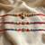 Multi color set of 3 thread rakhis traditional style