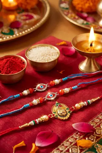 Multi color set of 3 thread rakhis traditional style