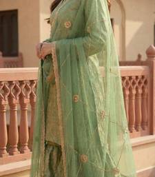 Elegant Pista Green Brocade Kurti and Sharara Set with Scalloped Dupatta