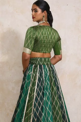 Orange Art Silk Lehenga-Choli Embellished with Zari on Velvet Blouse and Net Dupatta