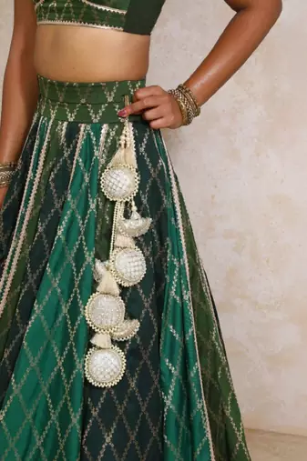 Orange Art Silk Lehenga-Choli Embellished with Zari on Velvet Blouse and Net Dupatta