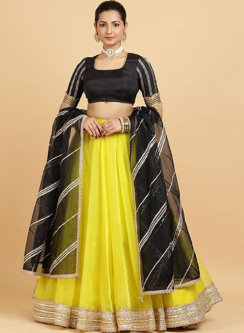 Embellished Semi-Stitched Lehenga & Blouse With Dupatta - Yellow Net Lehenga Choli with Zari Embellishment