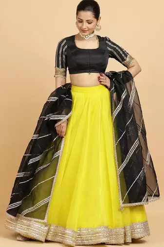 Embellished Semi-Stitched Lehenga & Blouse With Dupatta - Yellow Net Lehenga Choli with Zari Embellishment