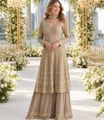 Beige heavy georgette free size stitched suit with sequence & diamond work
