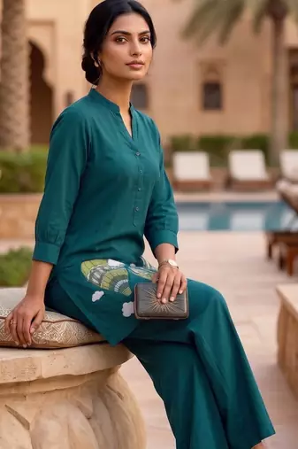 Trendy solid rama cotton kurta with hot air balloon embroidery and matching trousers