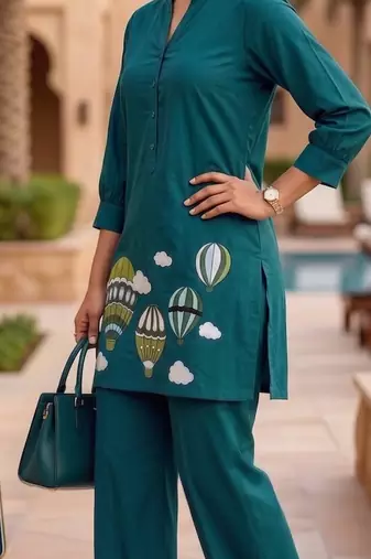 Trendy solid rama cotton kurta with hot air balloon embroidery and matching trousers