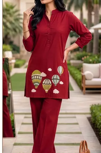 Trendy solid red cotton kurta with hot air balloon embroidery and matching trousers