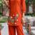 Trendy solid orange cotton kurta with hot air balloon embroidery and matching trousers