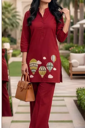 Trendy solid red cotton kurta with hot air balloon embroidery and matching trousers