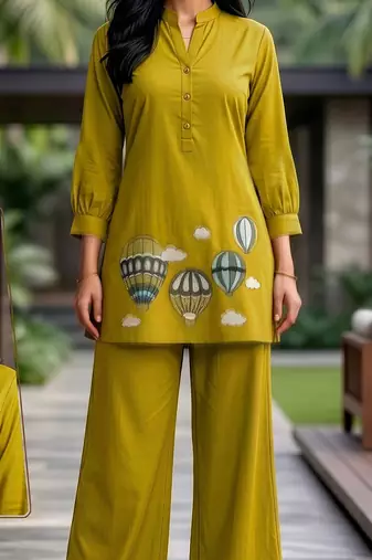 Trendy solid olive green cotton kurta with hot air balloon embroidery and matching trousers
