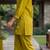 Trendy solid olive green cotton kurta with hot air balloon embroidery and matching trousers
