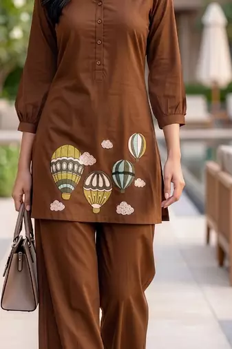 Trendy solid brown cotton kurta with hot air balloon embroidery and matching trousers