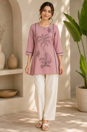  light pink cotton kurta with black botanical embroidery and white trousers