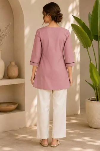 New elegant light pink cotton kurta with black botanical embroidery and white trousers