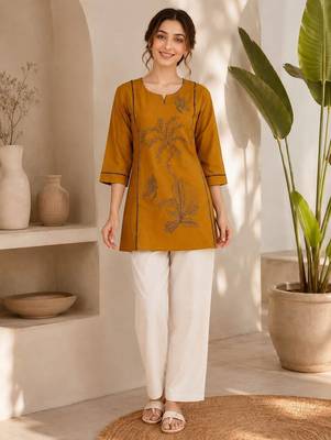  mustard cotton kurta with black botanical embroidery and white trousers 1