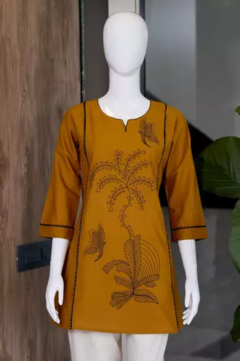New elegant mustard  cotton kurta with black botanical embroidery and white trousers