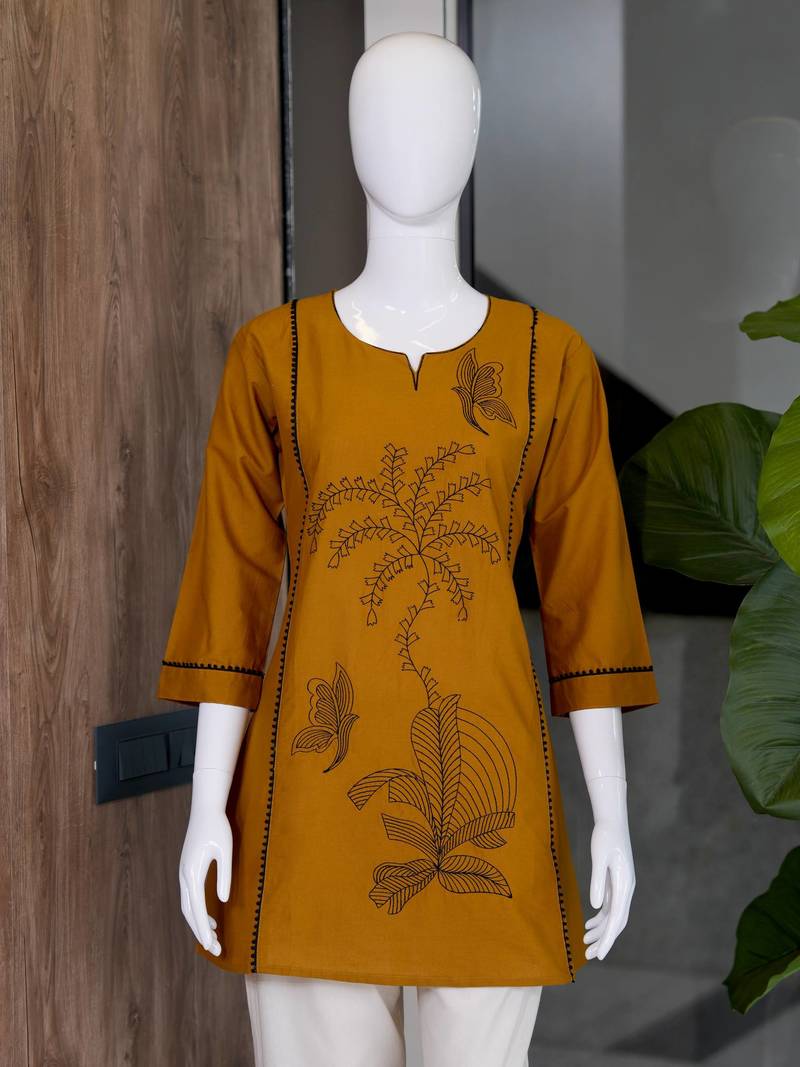 New elegant mustard  cotton kurta with black botanical embroidery and white trousers