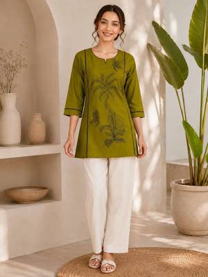  olive green cotton kurta with black botanical embroidery and white trousers 1