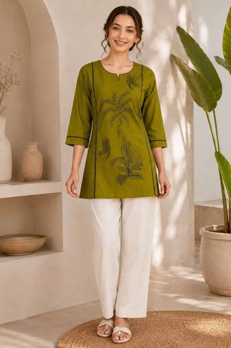  olive green cotton kurta with black botanical embroidery and white trousers