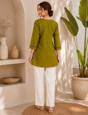  olive green cotton kurta with black botanical embroidery and white trousers 3