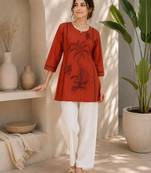 New elegant rust cotton kurta with black botanical embroidery and white trousers