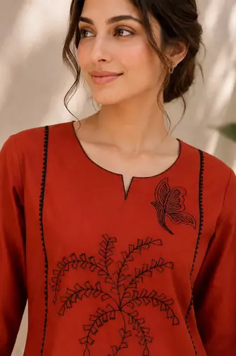 New elegant rust cotton kurta with black botanical embroidery and white trousers