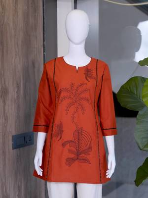  rust cotton kurta with black botanical embroidery and white trousers 4