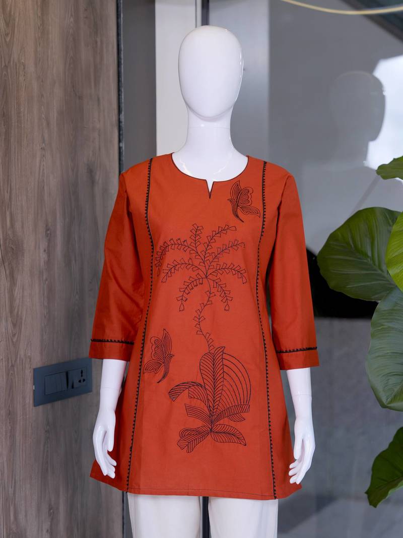 New elegant rust cotton kurta with black botanical embroidery and white trousers