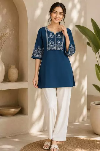 Women's stylish blue ethnic kurti with white pant co-ord set