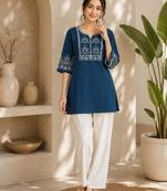 Women's stylish blue ethnic kurti with white pant co-ord set