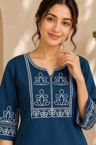 Women's stylish blue ethnic kurti with white pant co-ord set